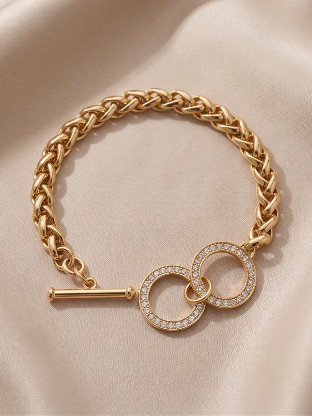 Elegant Gold Toned Chain Bracelet With Sparkling Circular Charms